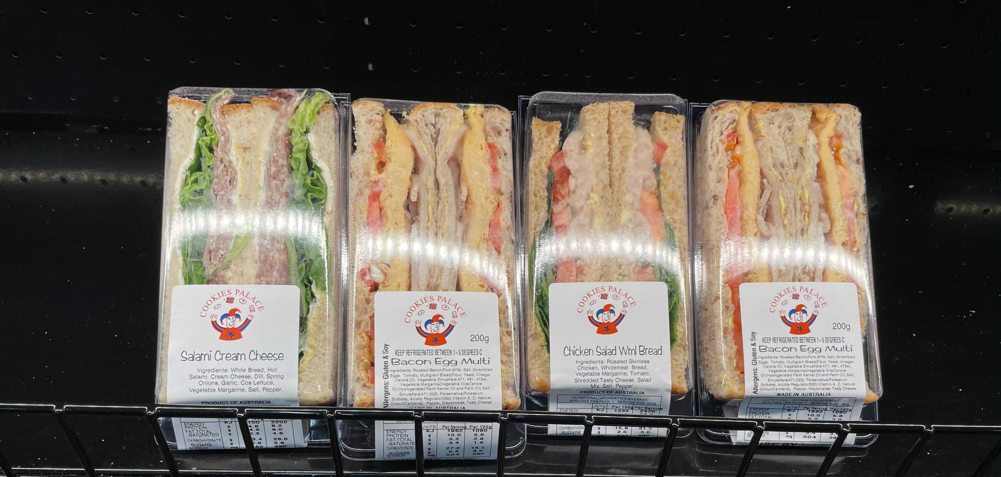 pre-packaged-sandwiches-cooked-tuna-salad-breakfast-bacon-egg-tomato-multigrain-bread-chicken-wholemeal-retail-shelf-ready-labelled-barcoded-refrigerated